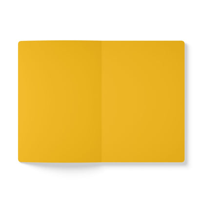 An open, vibrant journal with blank, yellow pages lies flat on a white background. The smooth pages invite daily journaling, while a subtle shadow along the left edge adds depth to the image.