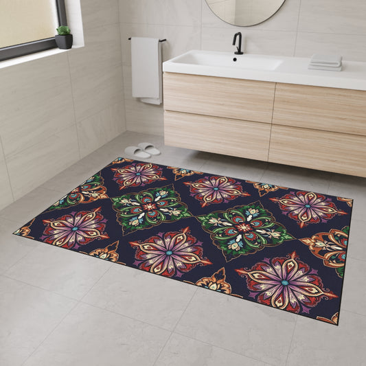 A modern bathroom with light beige tiles, floating wooden vanity, and a round mirror. The floor showcases a vibrant rug with African-inspired aesthetics and intricate mandala patterns, complete with custom floor mats and non-slip rubber backing for safety.