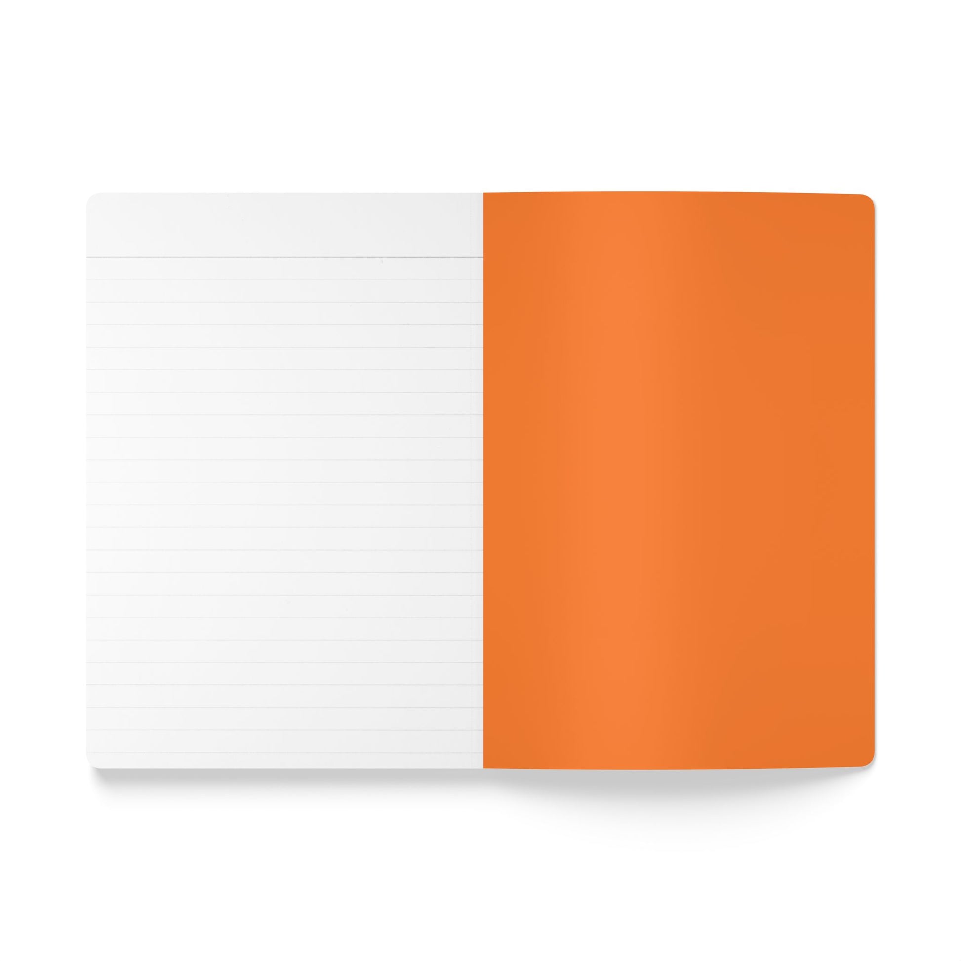 An open creative journal lies flat; the left page is lined and white, while the right side shows an orange cover folded back, hiding the opposite page. The white background emphasizes the notebook’s clean, minimal design.