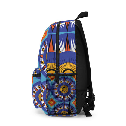 Side view of a vibrant backpack featuring a bold geometric and sunburst pattern in blue, orange, yellow, white, and black. This African-inspired backpack has a front pocket, black straps, top handle, and the lively design extends across every side.