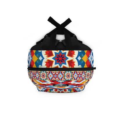 A colorful duffel bag with black handles, featuring vibrant geometric and starburst patterns in red, blue, yellow, and white—echoing the bold style of an African-inspired backpack. Accented by a horizontal band of repeating shapes on a plain white background.