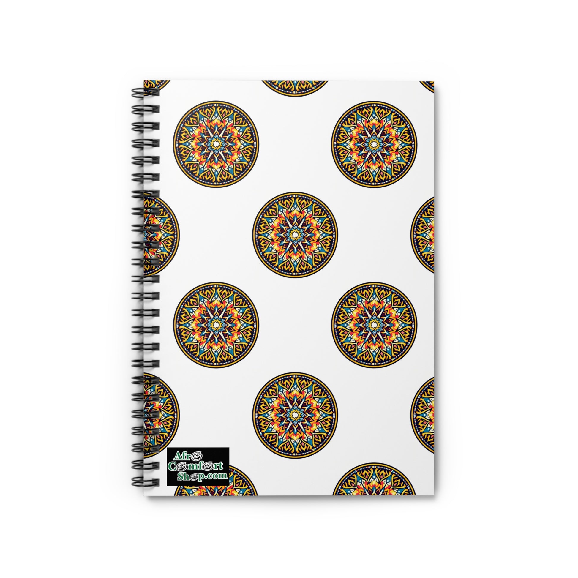 A premium writing journal, this spiral-bound notebook features a white cover adorned with a repeating pattern of intricate, colorful mandalas inspired by African art. A small black label on the bottom left corner reads, Allies Content Kingdom.