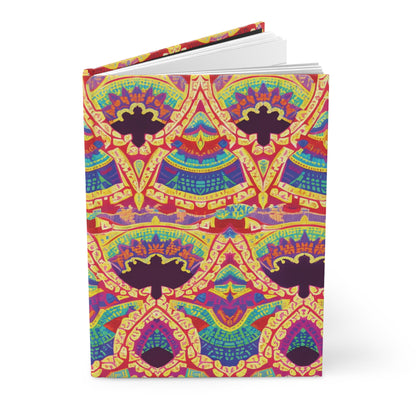 An African-inspired notebook with a vibrant, symmetrical pattern in yellow, red, purple, blue, and green. Intricate geometric and floral elements form repeating arches across the cover. This hardcover journal stands upright, slightly open.