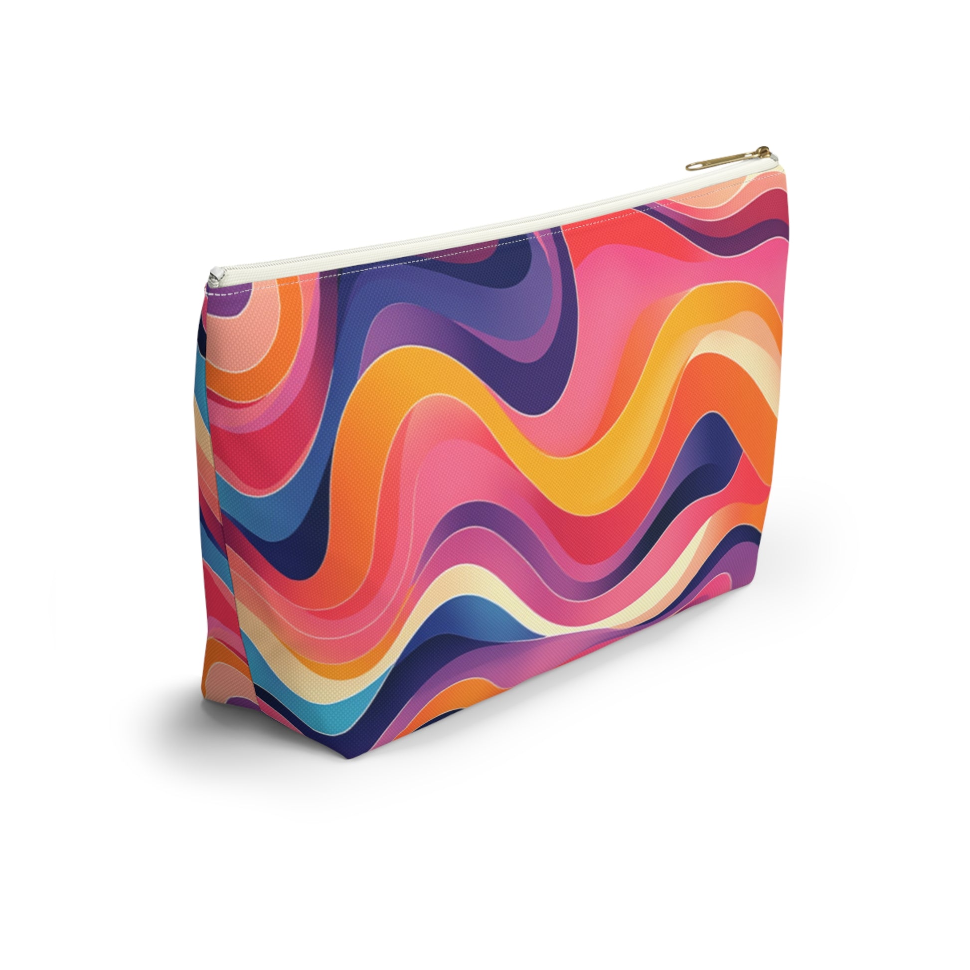 A rectangular T-bottom pouch stands on a white surface. Its exterior features bold, wavy lines in vibrant colors, reminiscent of African-inspired patterns, creating a psychedelic, abstract look. The zipper is white with a gold pull—perfect as a cosmetic travel bag.