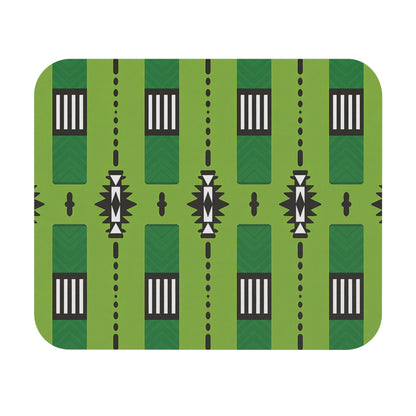 A geometric pattern features vertical green stripes with darker chevron details. Black rectangles with white vertical bars alternate with abstract sunburst shapes along the stripes. This creative desk accessory has a non-slip rubber base and an African-inspired mouse pad design.