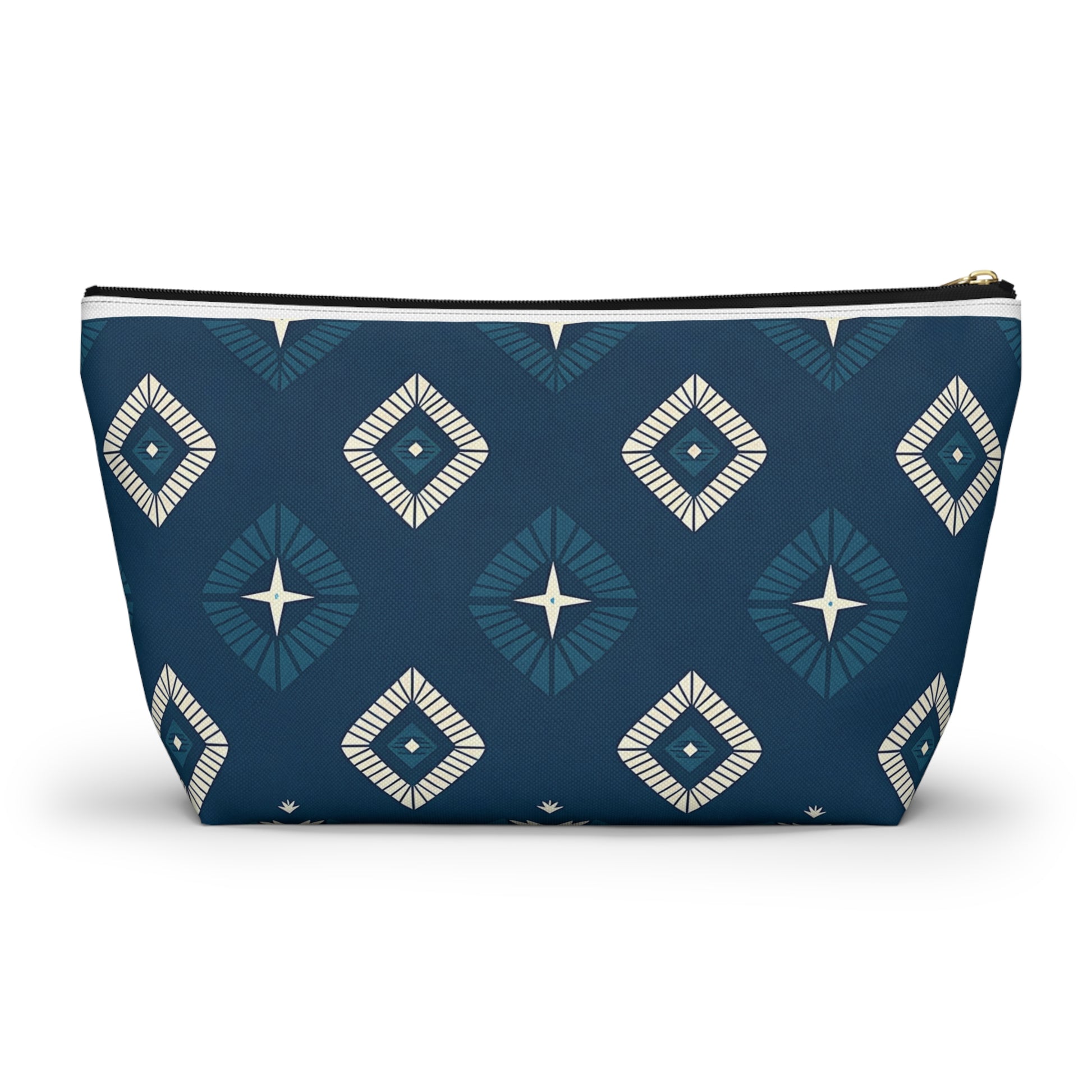 A zippered T-bottom pouch stands upright, featuring a dark blue background with African-inspired patterns—repeating geometric diamond shapes in lighter blue and cream, each with a star-like center for a modern, symmetrical cosmetic travel bag design.