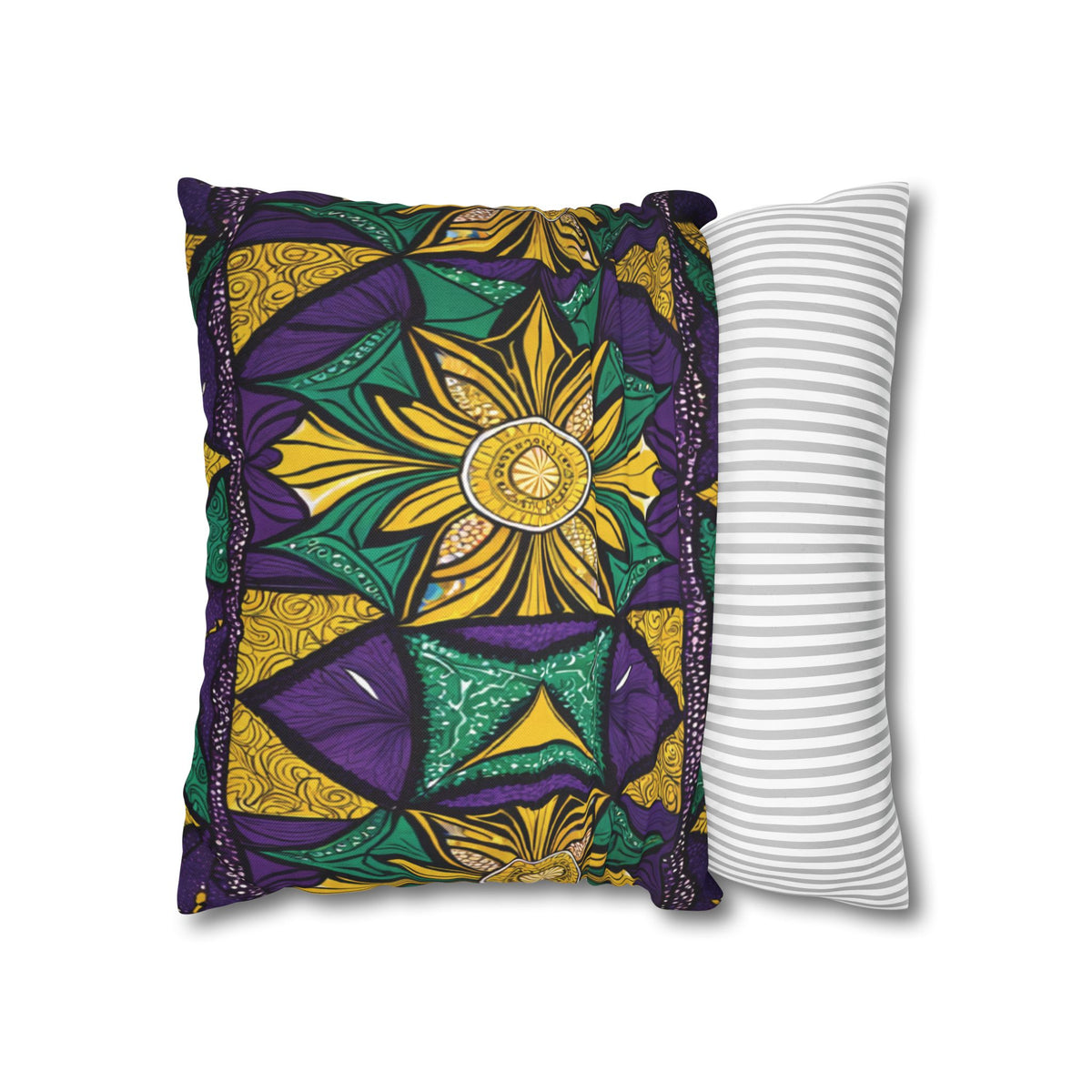 A rectangular pillow with one side featuring bold, African-inspired patterns in yellow, green, black, and purple, and the other side displaying simple horizontal gray and white stripes. The vibrant pillowcase is set against a plain white background.