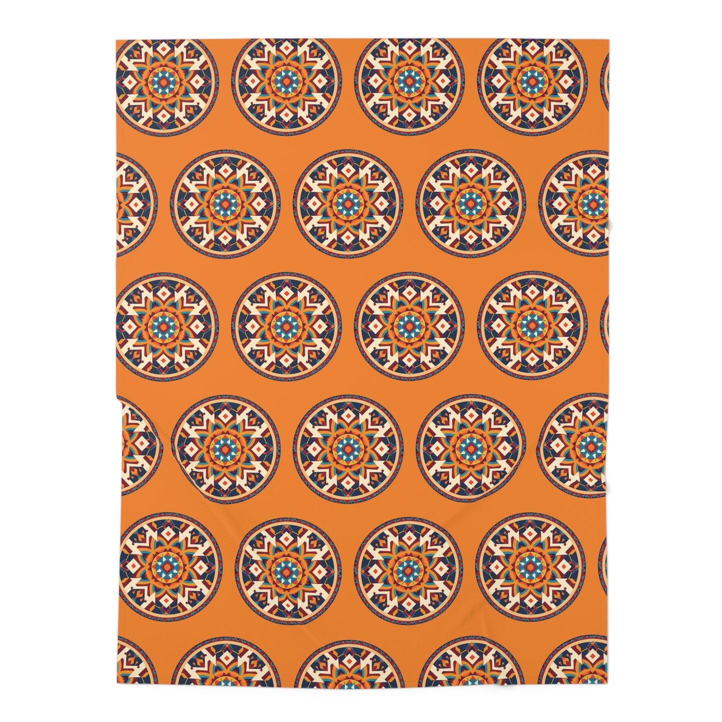 A soft baby blanket with an orange background features a repeating pattern of circular geometric mandalas in navy blue, white, and teal. The vibrant, symmetrical design draws inspiration from African-inspired decor, adding a unique touch to any space.