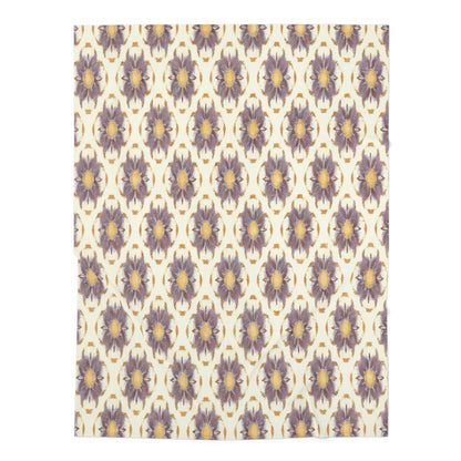 Repetition of large, stylized purple and gold flowers with yellow centers on a cream background creates a symmetrical, vintage look—perfect for African-inspired decor or as a custom swaddle blanket with timeless charm.