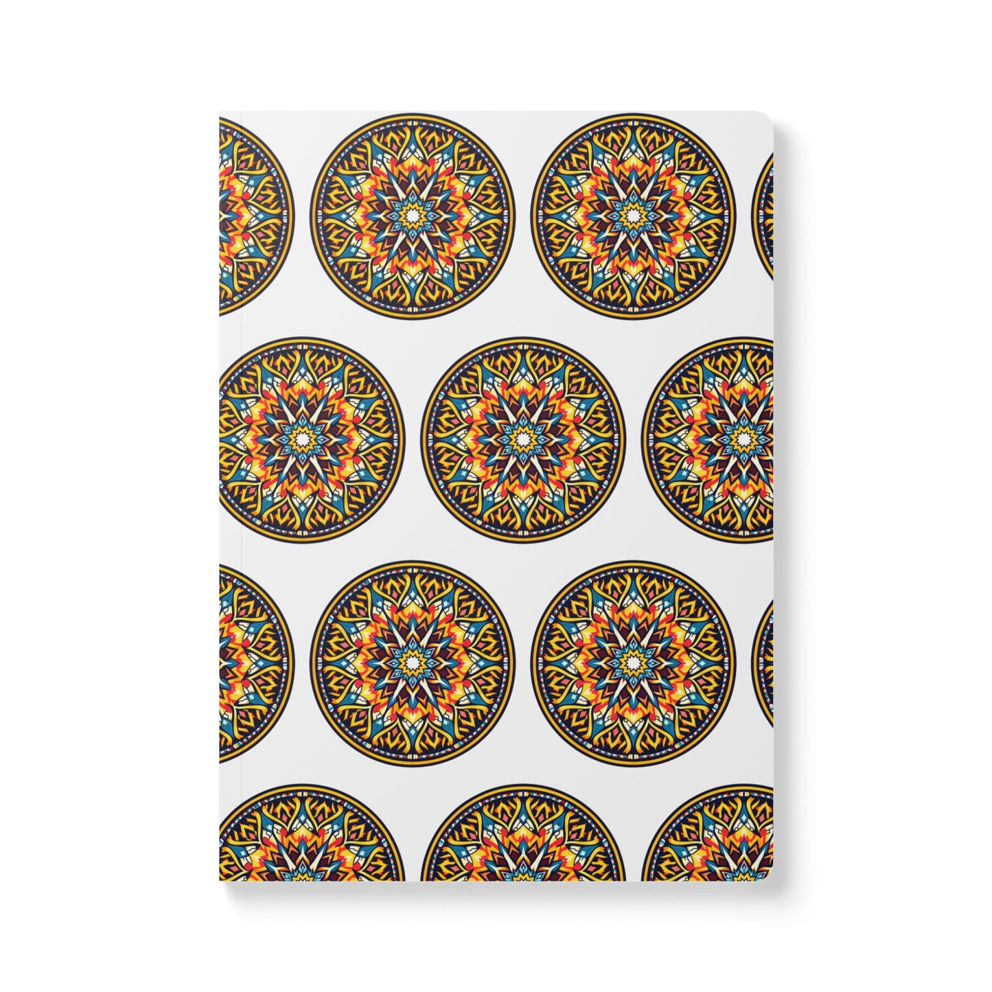 A white notebook cover features a repeating pattern of circular, colorful mandalas with intricate orange, blue, yellow, and black geometric designs—an African-inspired journal perfect for daily journaling.