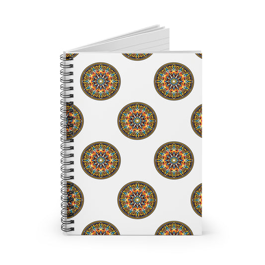 A spiral-bound notebook with a white cover features colorful, intricate circular mandala designs, inspired by culturally inspired designs. Partially open, it offers a premium writing experience on blank white pages. The look is clean and vibrant.