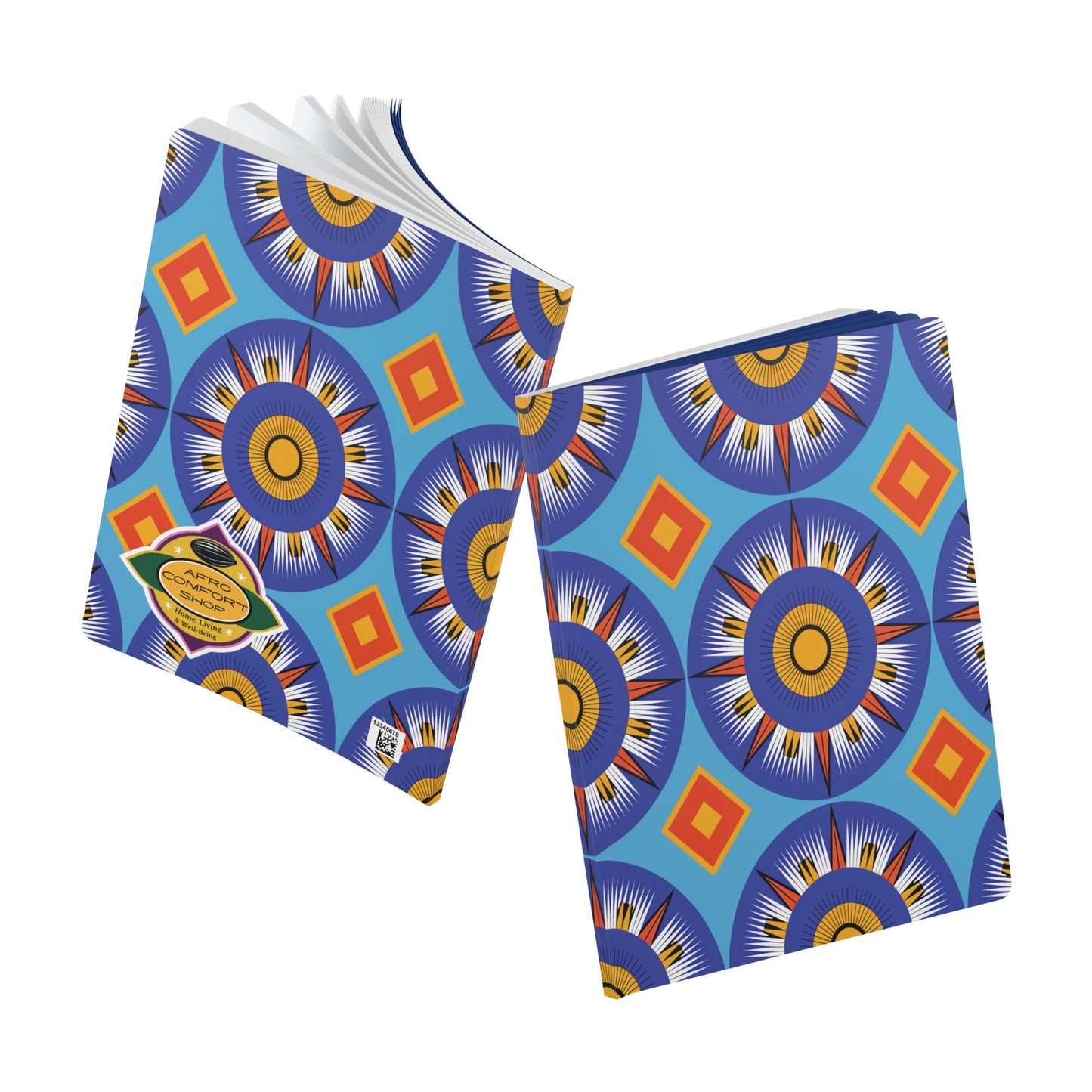 Two notebooks with bold, African-inspired geometric patterns in blue, orange, and yellow—perfect for daily journaling. One creative journal is partially open, the other closed and tilted, both featuring a gold label on the bottom left.