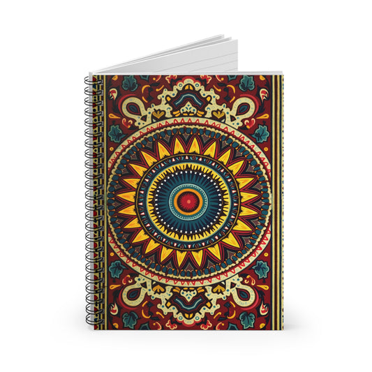 A premium writing notebook with a vibrant cover featuring a colorful, intricate mandala design. This culturally inspired journal includes yellow, red, blue, and green elements in ornate concentric circles on a dark background. The pages are blank and white.