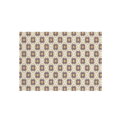 A repeating pattern with stylized, symmetrical floral shapes in purple and beige, each featuring a small yellow circle at the center, set against a light cream background. The African-inspired design creates a vintage, ornamental look with a consistent, geometric arrangement.