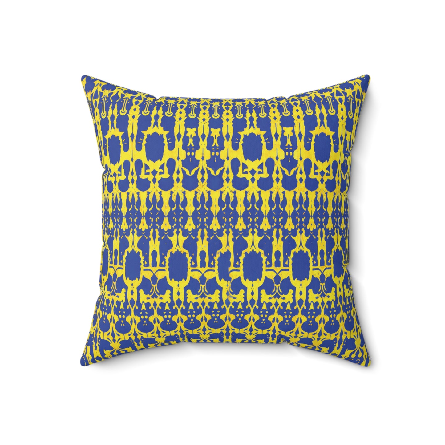 A square African accent pillow featuring a vibrant geometric pattern in blue and yellow. The symmetrical, abstract shapes create a bold, modern look. Photographed against a white background, the colorful faux suede pillow stands out beautifully.