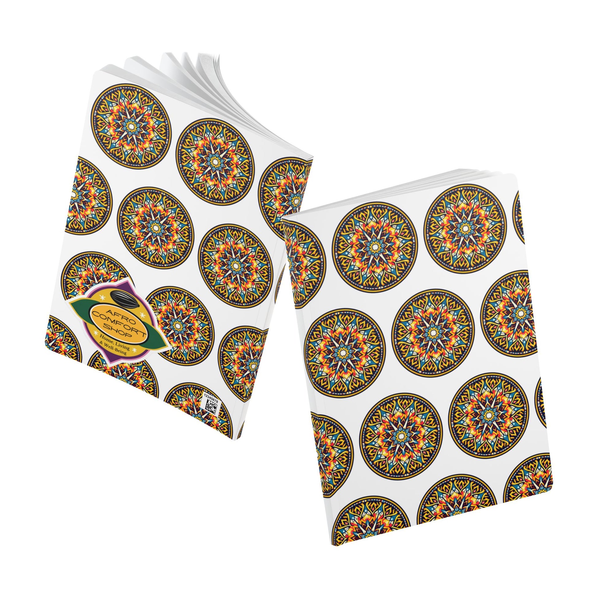 Two softcover notebooks with white backgrounds are displayed, each featuring a repeating pattern of colorful, kaleidoscopic mandala designs inspired by African art. Perfect as a creative journal for daily journaling or capturing your thoughts in style.