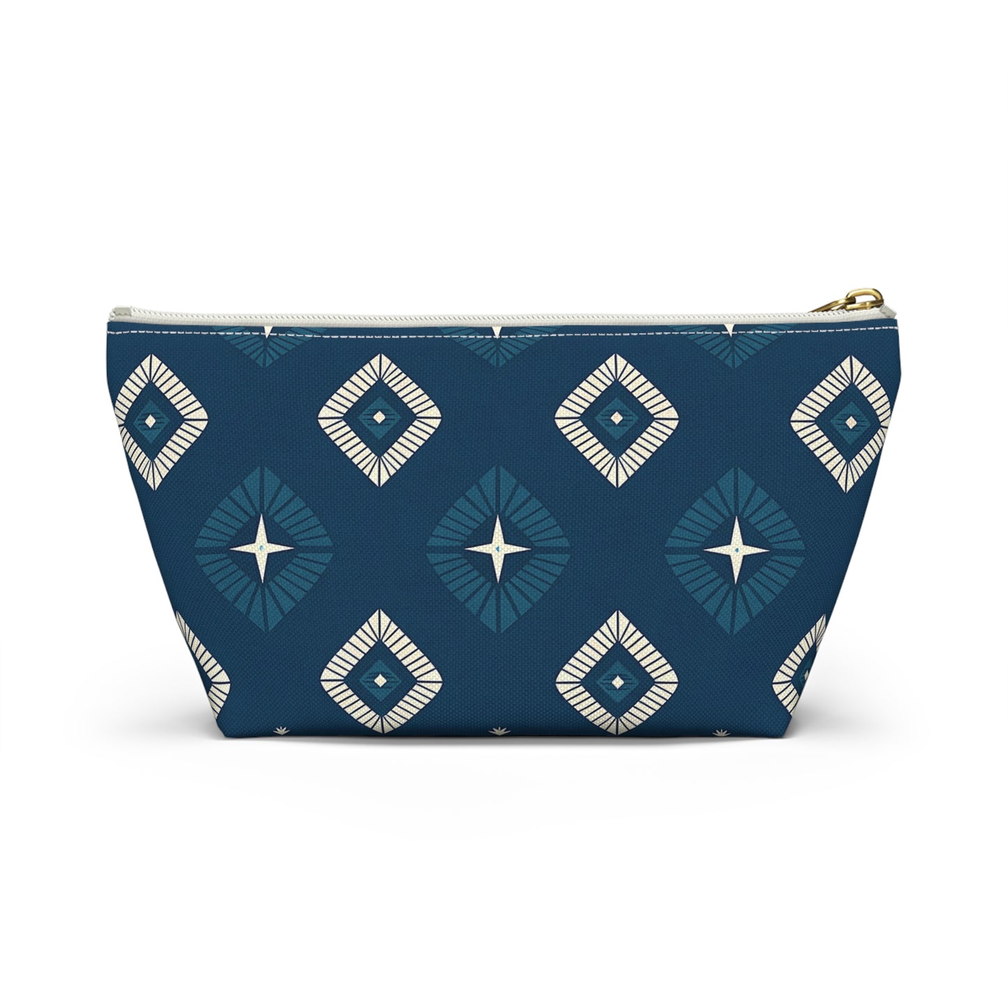 A blue zippered pouch with African-inspired geometric diamond patterns in white and teal. Perfect as a cosmetic travel bag, it features a central starburst design, white zipper with brass pull, and sits upright against a white background.