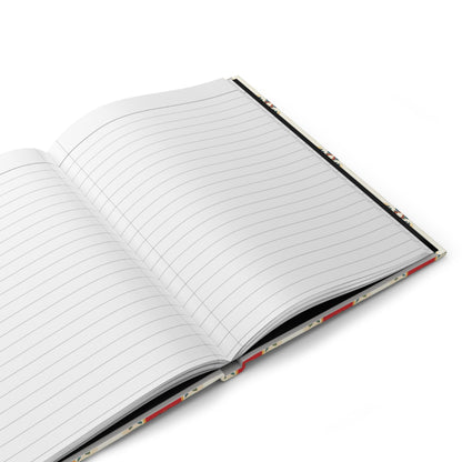 An open wellness journal with lined white pages lies on a white surface. The blank pages and the cover’s hint of red and black are visible. The notebook is angled diagonally from bottom left to top right.
