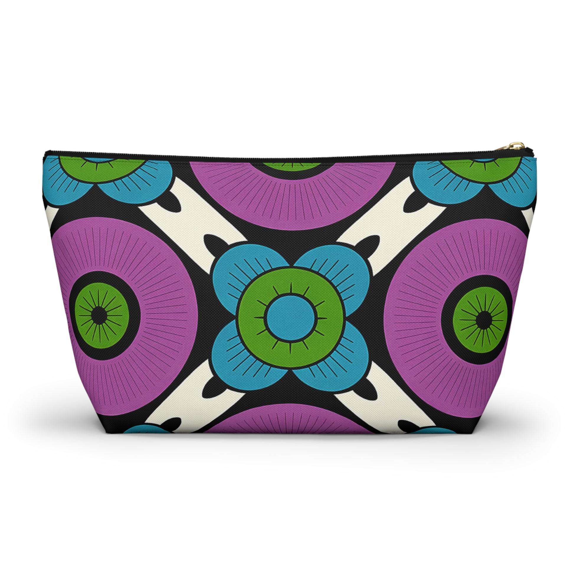 A vibrant cosmetic travel bag with a bold, symmetrical pattern of large purple circles and blue-green stylized flowers, accented by African-inspired patterns in black and white. This retro, geometric T-bottom pouch offers striking visual appeal.