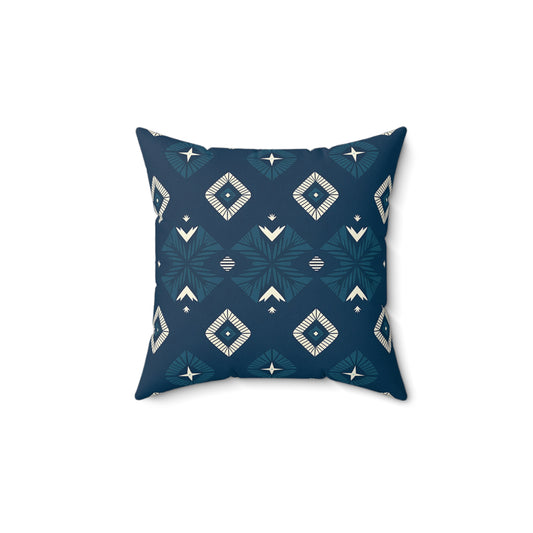 Square pillow with a dark blue background and geometric diamond shapes in white and light blue, arranged symmetrically. This African-inspired pillow brings a modern, bohemian touch to unique home decor, making vibrant pillows the highlight of any space.