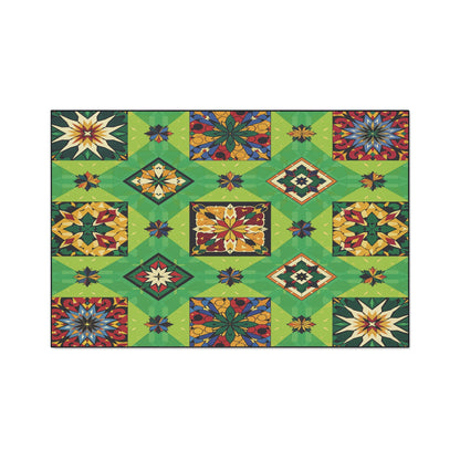 A colorful geometric quilt pattern with square blocks in shades of green, blue, red, and yellow. Each block showcases intricate, African-inspired starburst and diamond designs, creating a vibrant mosaic perfect for custom floor mats with non-slip rubber backing.