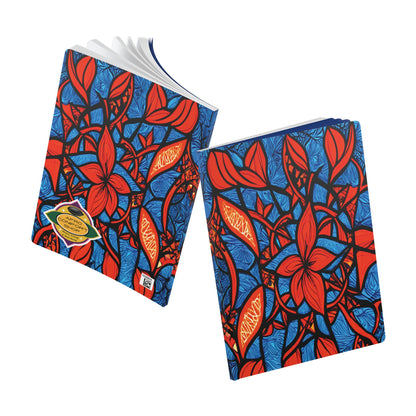 Two colorful notebooks with bold, abstract floral covers in red, blue, and black are accented by yellow-orange ovals—perfect for daily journaling or as a creative journal. One is open, the other closed, both displayed on a white background.