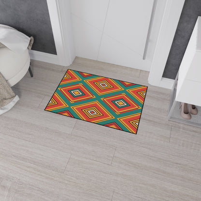 A colorful, non-slip doormat with a bold geometric diamond pattern in red, orange, yellow, blue, and black sits on light wood-look tile flooring near a white wall, a bedroom, and a small white cabinet with beige high-heeled shoes underneath.