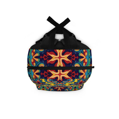 A colorful duffel bag with black handles features a vibrant, symmetrical pattern in red, yellow, blue, green, and orange tones. Its swirling motifs and bold geometric shapes give this African-inspired backpack an artistic, kaleidoscopic appearance.