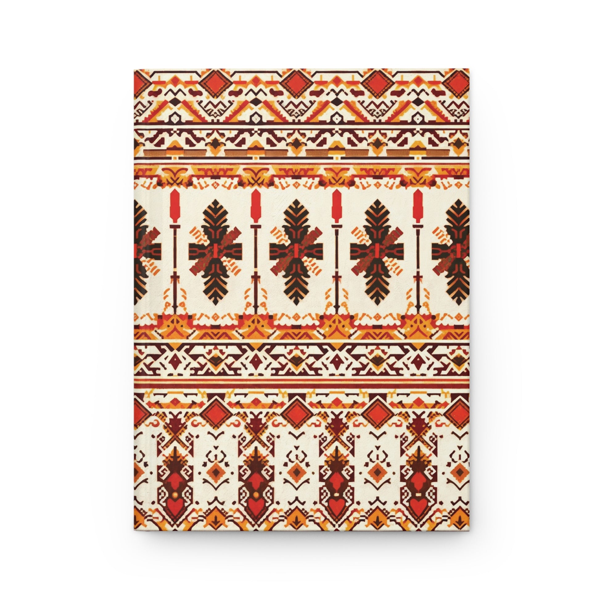 A rectangular canvas features a symmetrical, geometric tribal pattern in red, black, and yellow on a cream background. The design includes horizontal bands of repeating floral, diamond, and zigzag motifs, creating a vibrant look perfect for a hardcover journal.