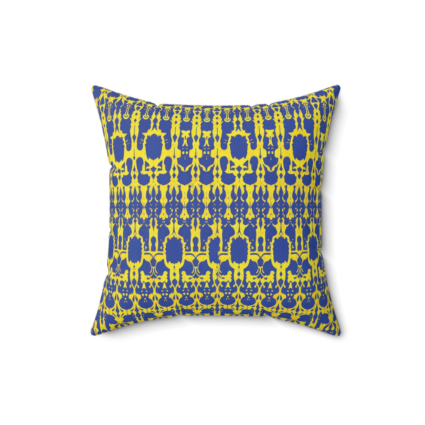 A square faux suede pillow with a bold geometric pattern in yellow and dark blue. The symmetrical motifs evoke the style of an African accent pillow, creating a visually striking contrast against the white background when viewed from the front.