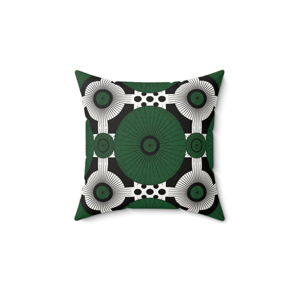 A square faux suede pillow with a bold geometric pattern featuring large green circles, white radiating lines, and small black dots. This green and black throw pillow adds a modern, eye-catching touch to any space. The pillow is centered on a white background.