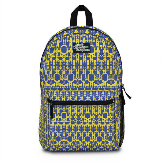 A boho chic rucksack with a vibrant yellow and blue geometric pattern, featuring interconnected shapes. It has a black zipper, front pocket, mesh side pocket, black straps, and a patch reading “Akintoye Campbell Collections” in white script.