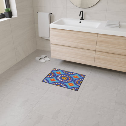 A modern bathroom with light tiled floors, a wooden vanity with a sink and towels, and white slippers by the wall. An African-inspired, geometric-patterned custom floor mat adds color and is non-slip for safety in front of the vanity.