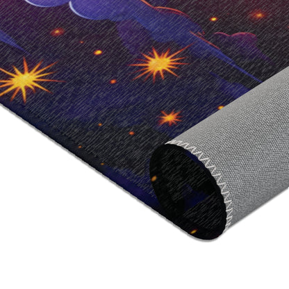 A close-up of a rolled-up mat featuring a colorful, star-filled night sky design on a dark background. Crafted from durable polyester, the mat’s edge shows visible stitching and the underside is a textured, light gray material.