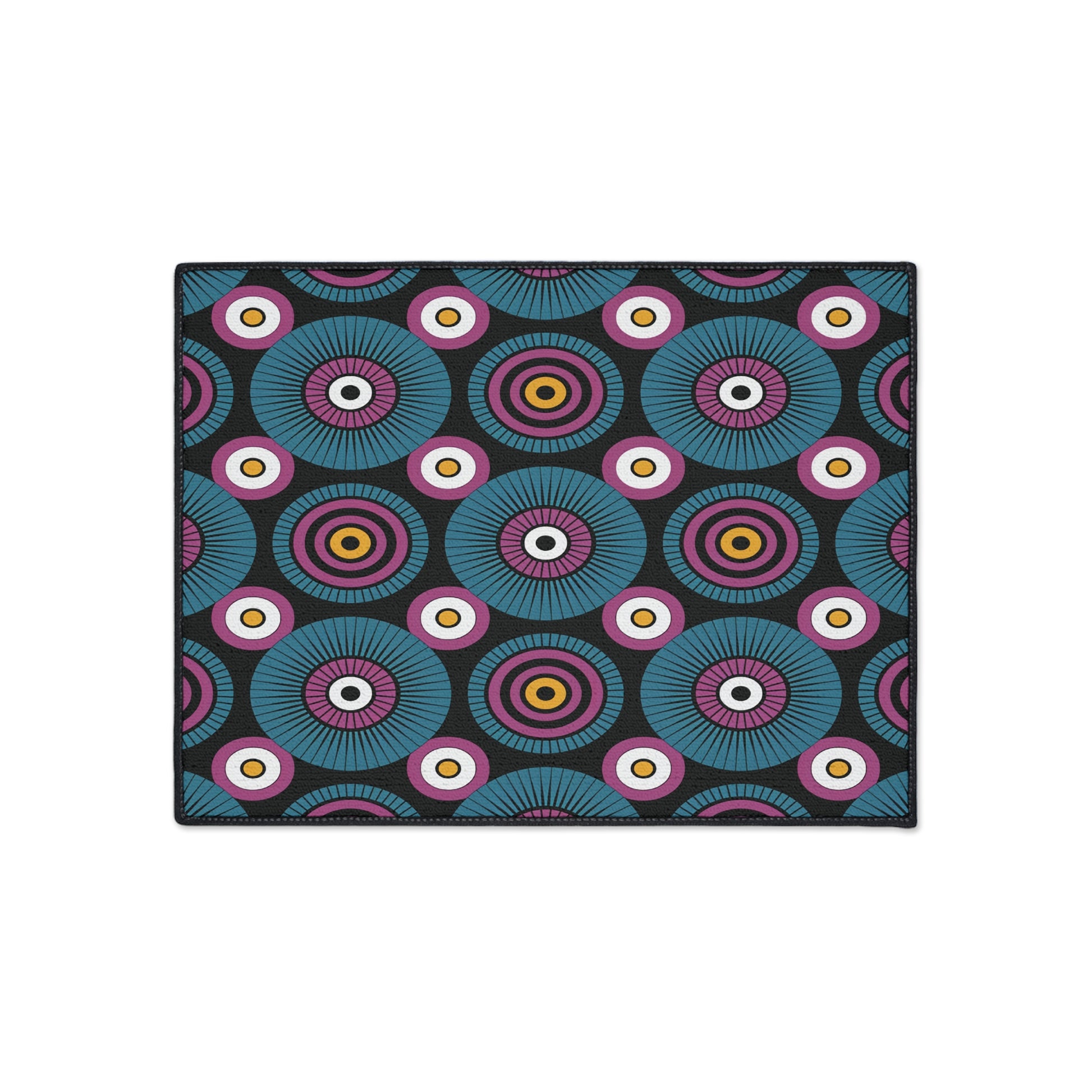 Rectangular mat with a repeating abstract pattern of concentric circles in vibrant hues on a black background. This African-inspired floor mat features a geometric, retro, kaleidoscopic effect and includes a non-slip rubber backing for added safety.