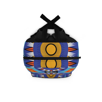A duffle bag with black handles features a bold design of yellow suns with radiating orange, white, and blue patterns on a blue background. The geometric motifs give this vibrant backpack a striking, symmetrical look.