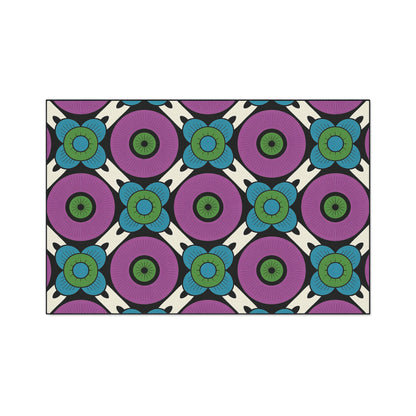 A geometric pattern featuring alternating purple circles with green centers and stylized blue and green flowers, arranged diagonally on a cream background with black outlining, blends retro style with African-inspired aesthetics—perfect for custom floor mats.