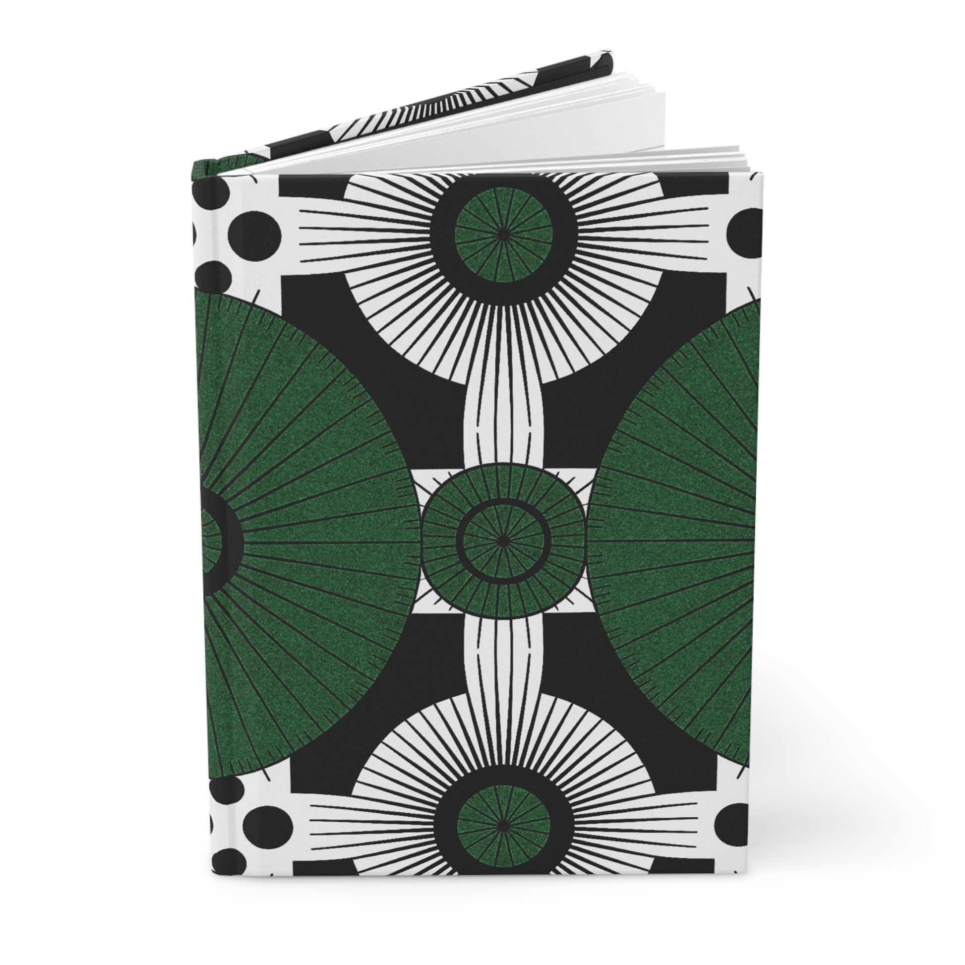 A hardcover African-inspired journal featuring a bold geometric pattern in black, white, and green. The front cover displays large green semicircles, white radial lines, black circles, and intricate motifs. The book is slightly open.