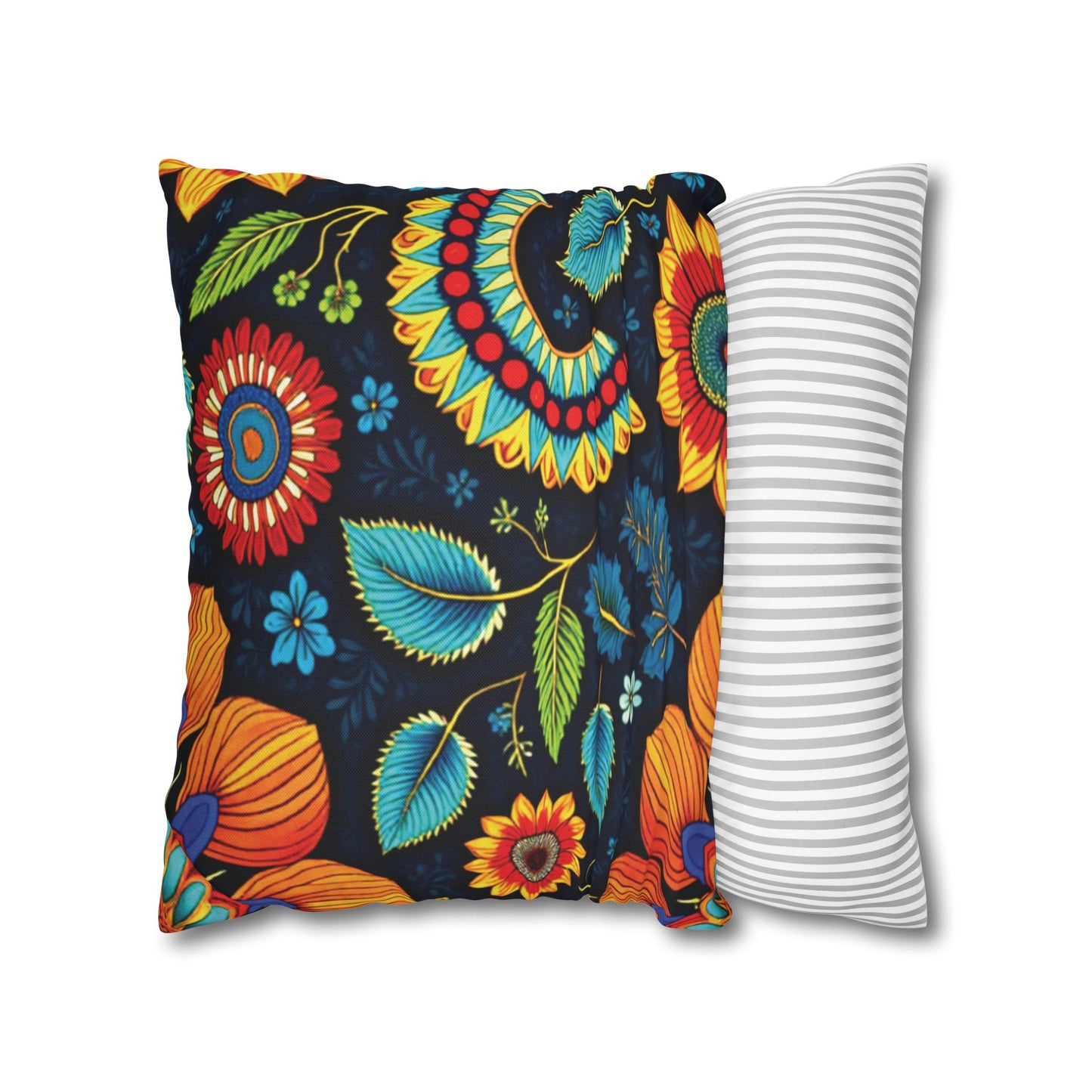 Two square pillows: the front one features vibrant pillowcases with colorful flowers and leaves on a black background, while the back pillow has a simple gray and white horizontal stripe design. Both are set against a plain white backdrop.