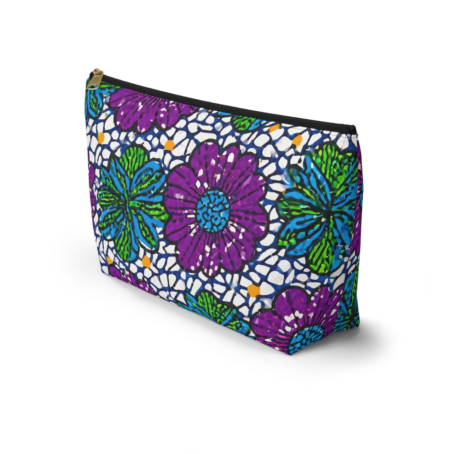 A T-bottom pouch with a zipper, decorated with vibrant, hand-drawn purple and blue flowers, green leaves, and white lace-like African-inspired patterns on a dark background. The cosmetic travel bag stands upright on a white surface.