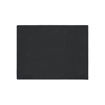 A rectangular black custom floor mat with a subtle textured pattern, viewed from above on a white background. The mat features neatly stitched edges, an even weave throughout its surface, and a non-slip backing for added safety.
