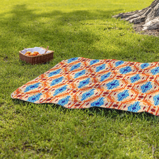 Crystal_Tide_Stadium_Blanket_StadiumBlanket_Lifestyle_Grass_H_Mockup.png