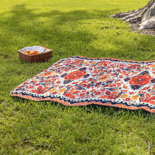 Ember_Splash_Stadium_Blanket_StadiumBlanket_Lifestyle_Grass_H_Mockup.png