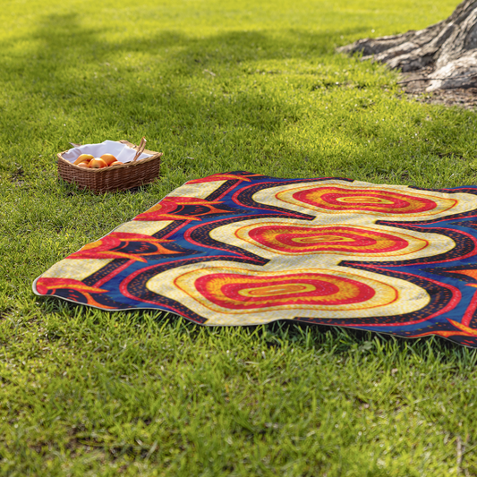 Radiant_Rush_Stadium_Blanket_StadiumBlanket_Lifestyle_Grass_H_Mockup.png