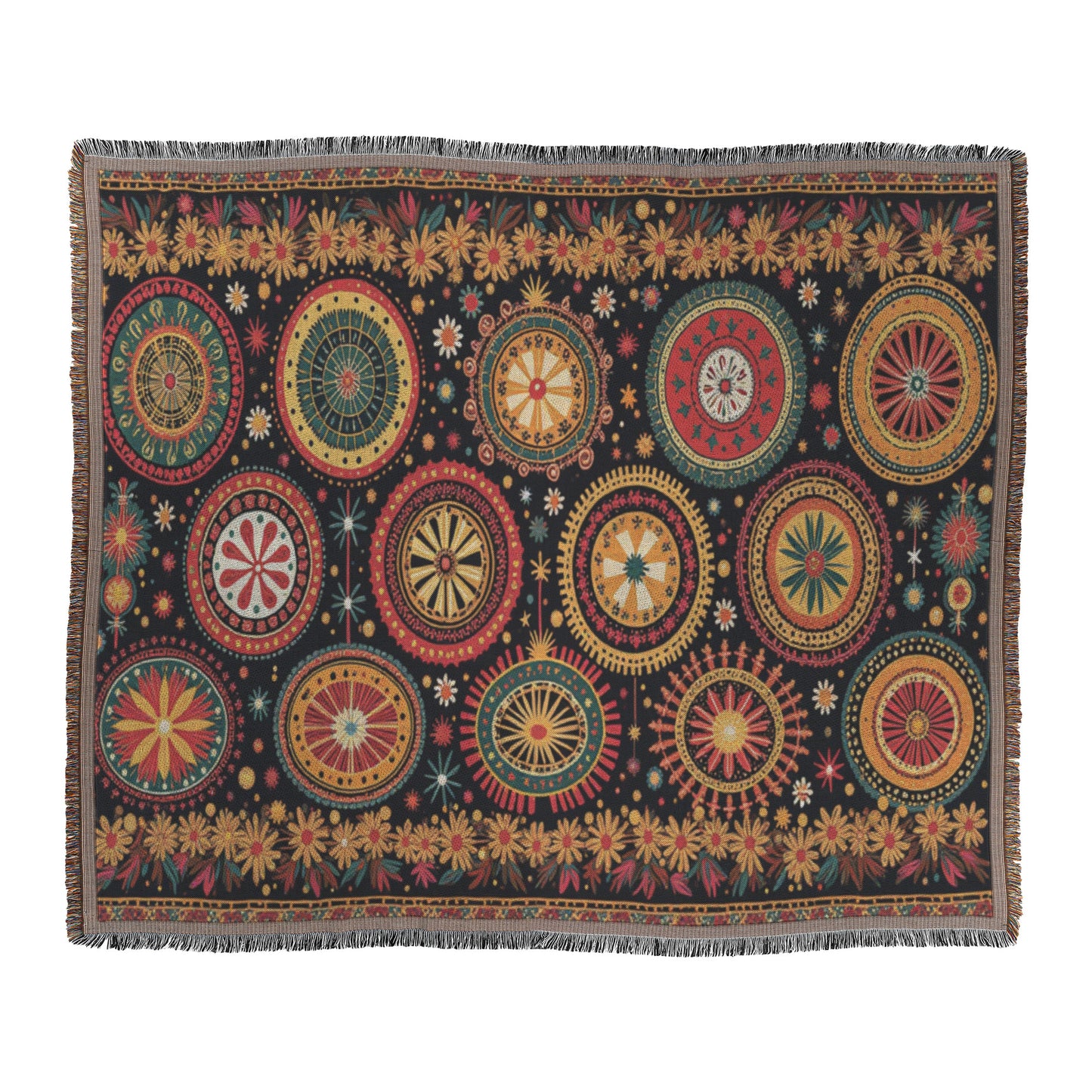 A rectangular textile with a black background features colorful, symmetrical circular patterns in red, yellow, green, and cream. Reminiscent of a West African print, this vibrant throw blanket includes smaller starburst and floral motifs and a short fringe on all edges.