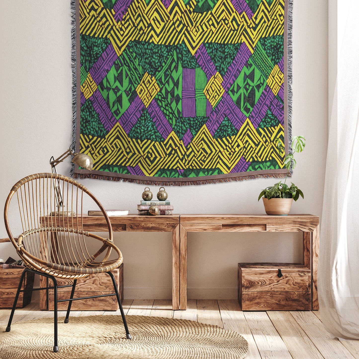 A cozy room with a woven rattan chair on a round rug, next to a wooden bench adorned with books and decor. A vibrant throw blanket adds color, while above, a geometric tapestry in green, yellow, and purple brightens the softly lit space.